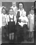 Слева направо: Таисия (1933-1996); Анатолий (1932-1935); Алла (1935); Ольга Лукинична Смышляева (Ксенчук) (1911 - 1962); Владимир (1937 - 1996); Надежда (1930 - 2000) г. Николаевск-на-Амуре, 1938 год.